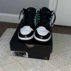 Jordan 1 Mid. Teal, white, and black